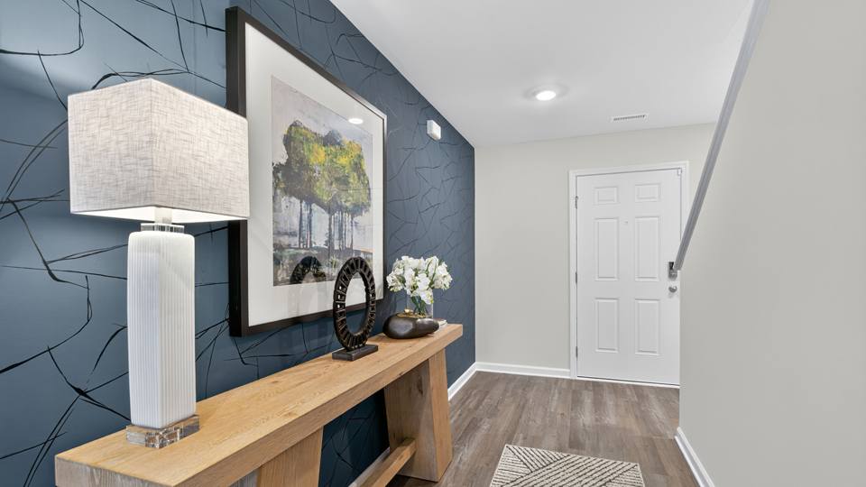 foyer entryway with revwood flooring