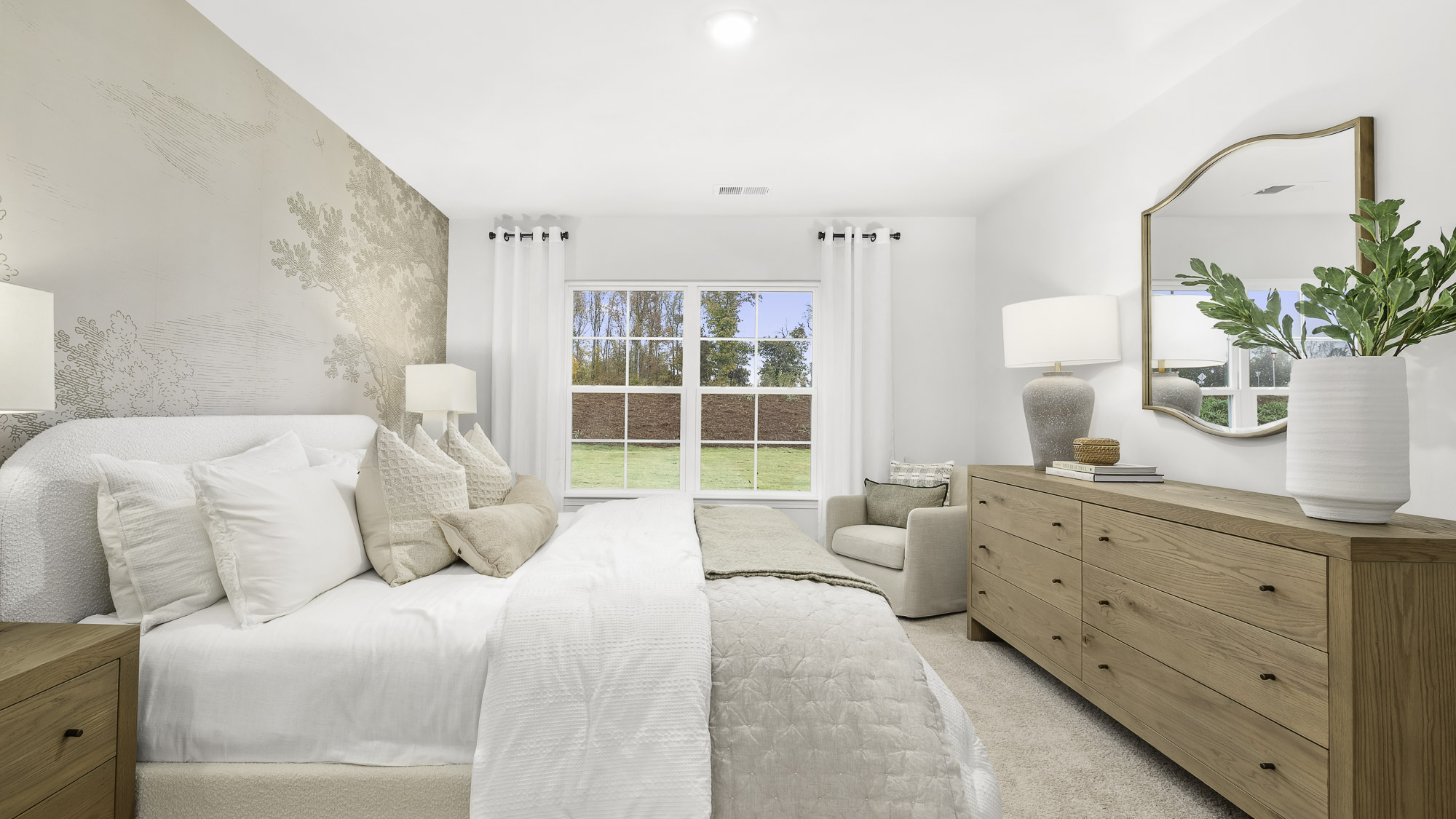 Primary bedroom with carpet flooring