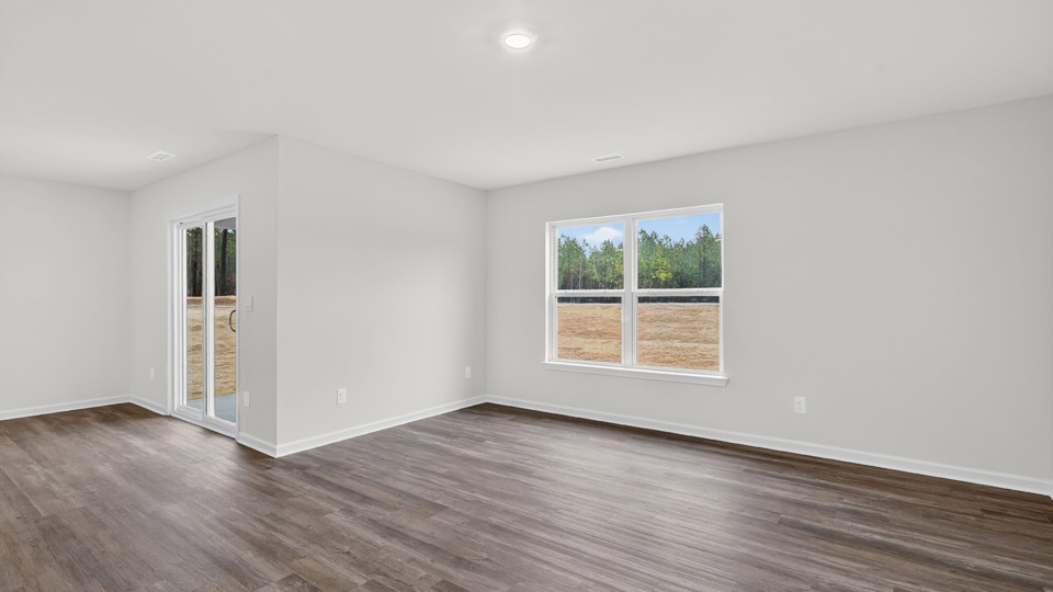 open concept living space with large windows