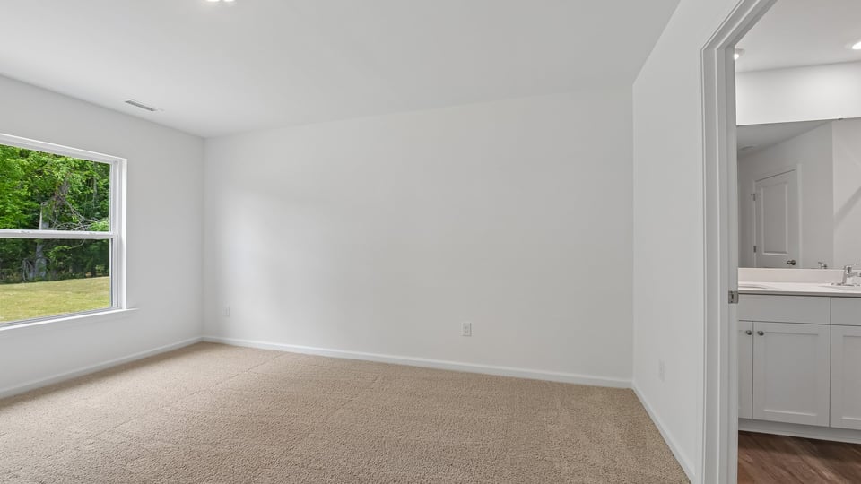 PRIMARY SUITE BEDROOM