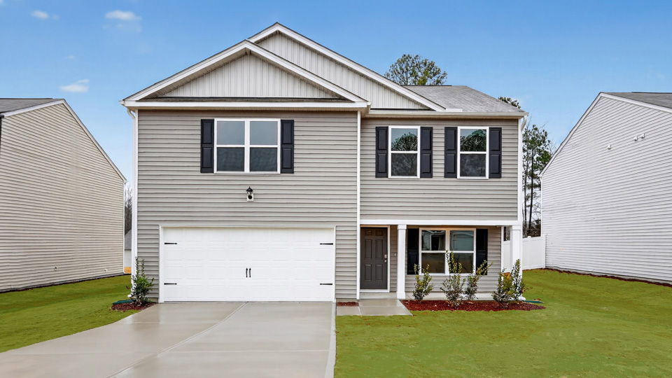 front exterior penwell with 2 car garage