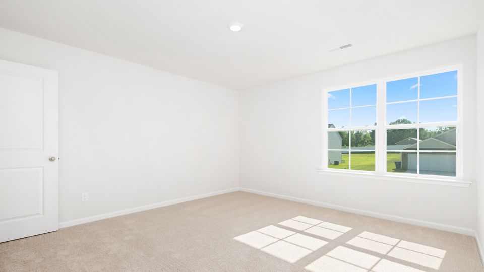Bedroom with carpet flooring