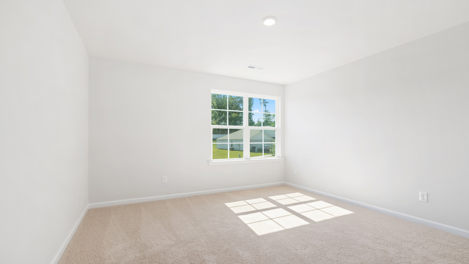Bedroom with carpet flooring