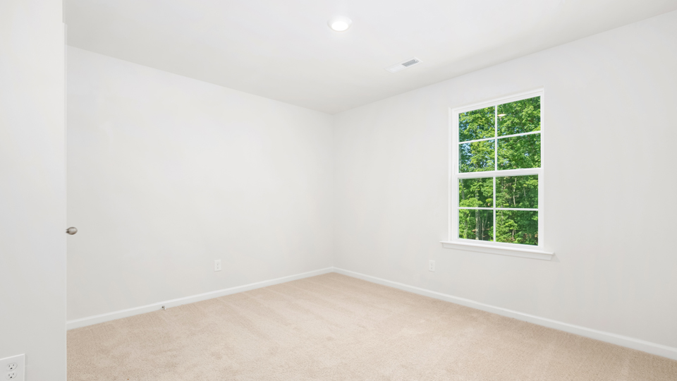 Bedroom with carpet flooring