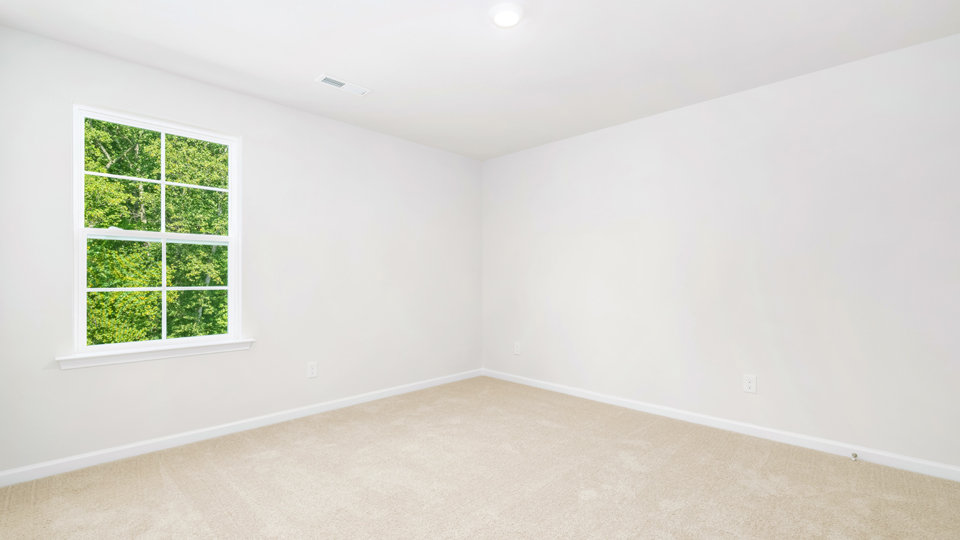 Bedroom with carpet flooring