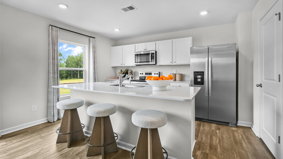 kitchen with stainless steel appliances and quartz countertops