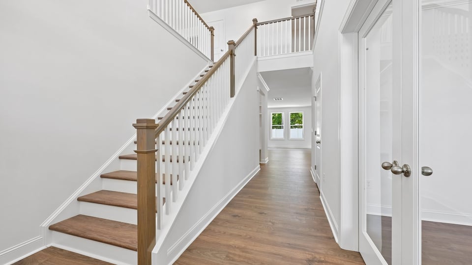 entryway and bottom of stairs leading to loft