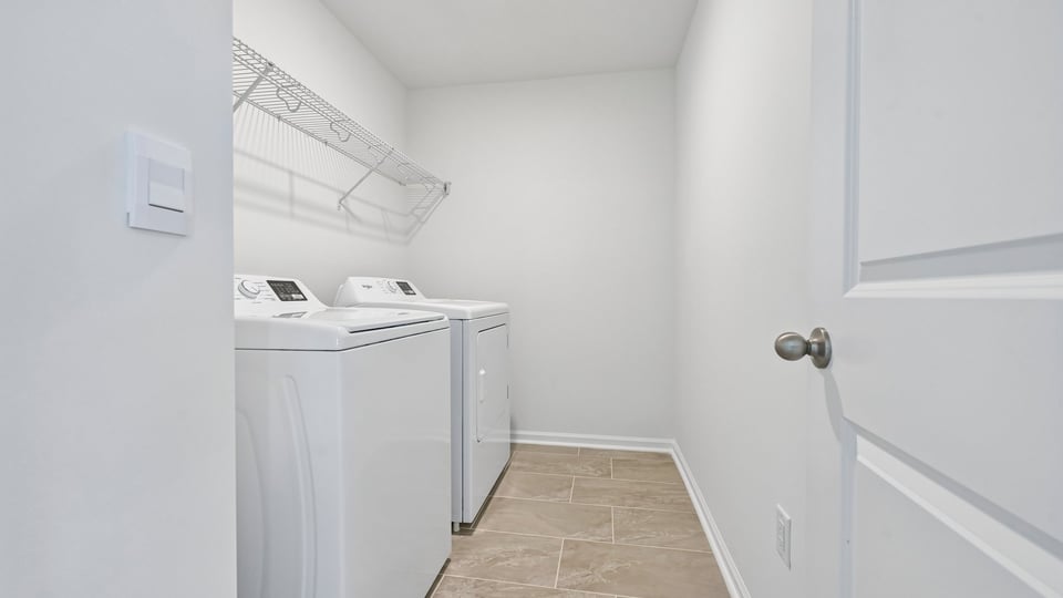laundry room with washer and dryer