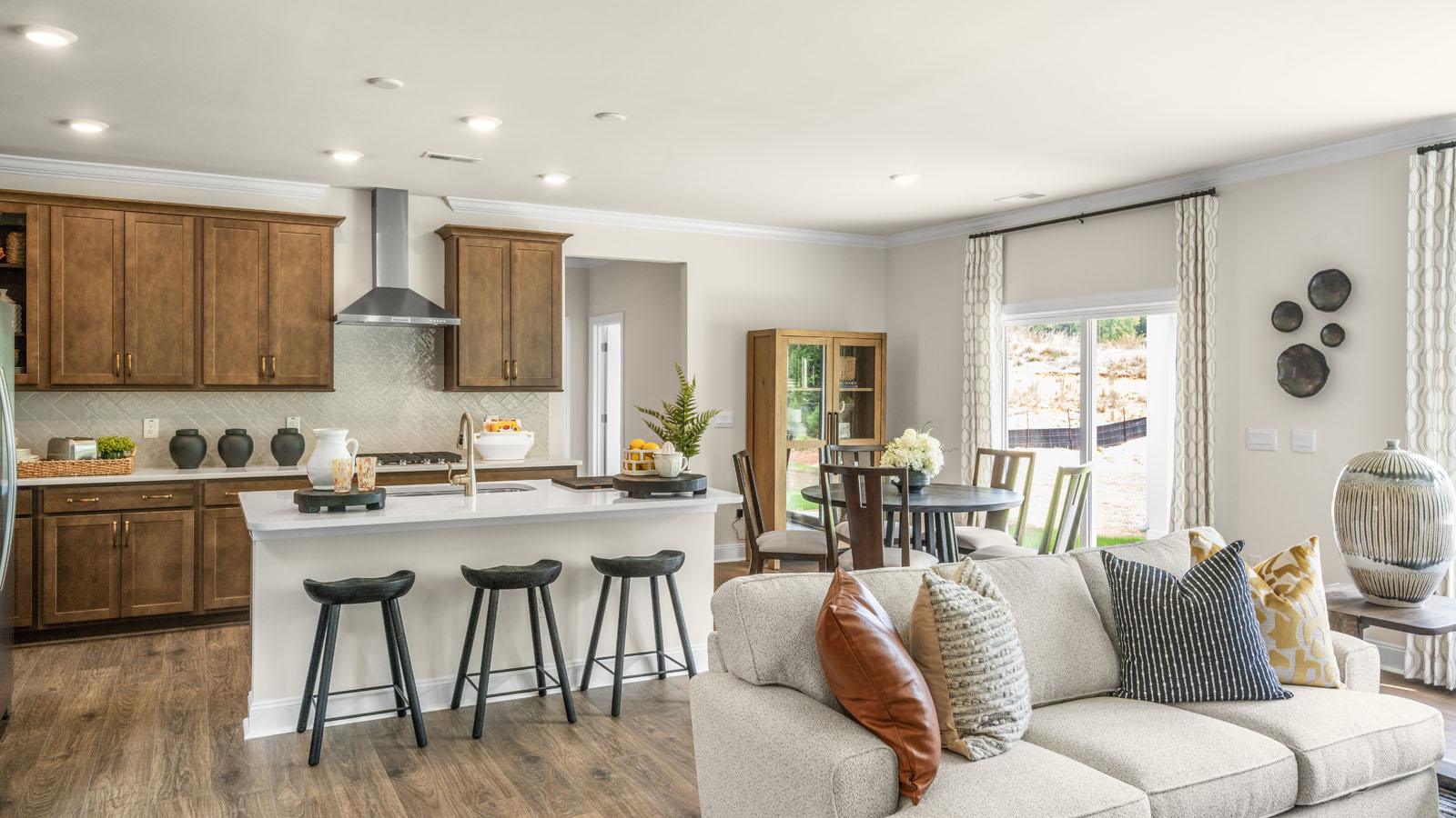 open concept living space with large windows