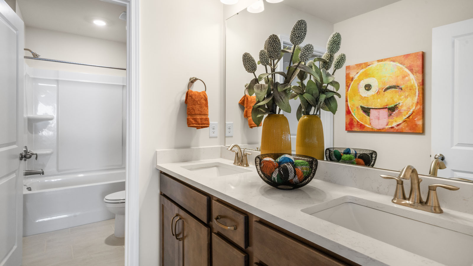 additional bathroom with double vanity sink