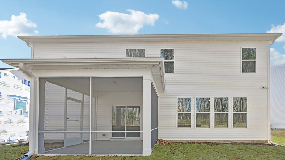 covered and screened in back patio