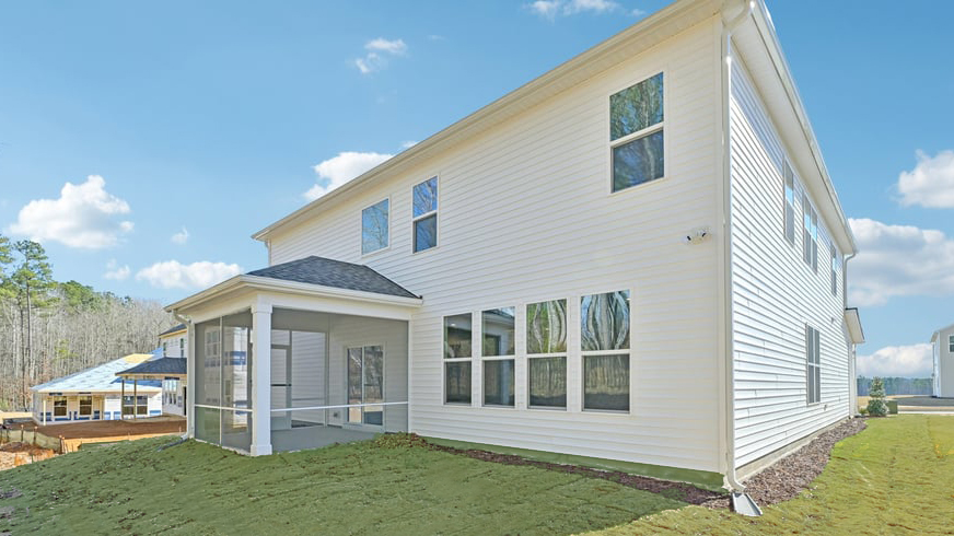 backyard with covered and screened back patio