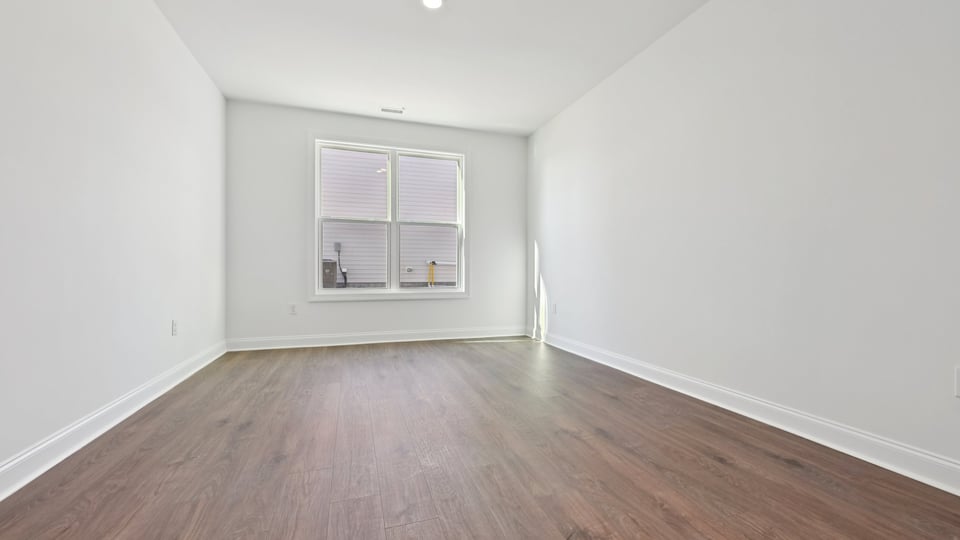 study with revwood flooring and natural lighting