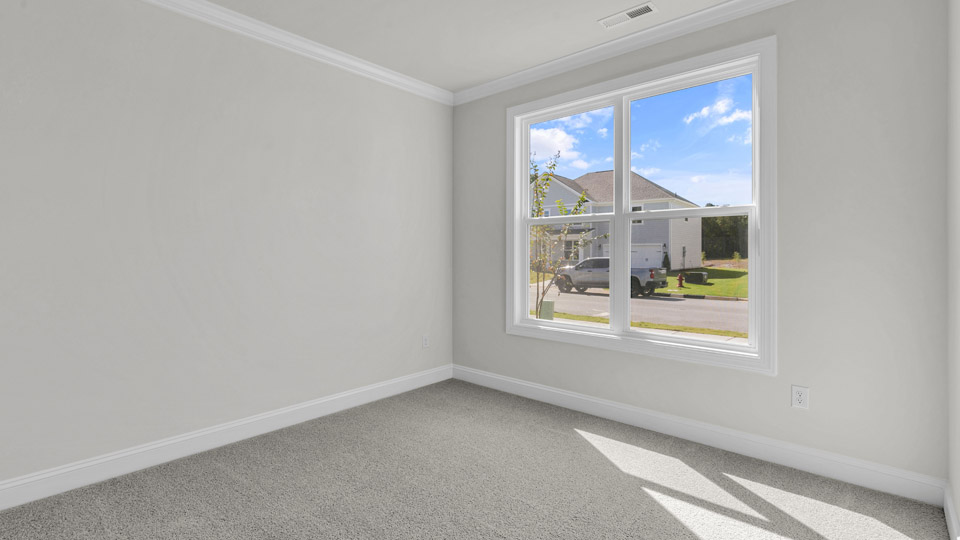 Bedroom with carpet flooring