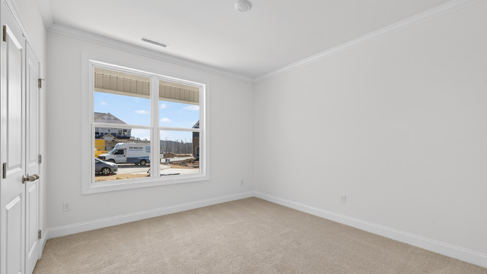 Bedroom with carpet flooring