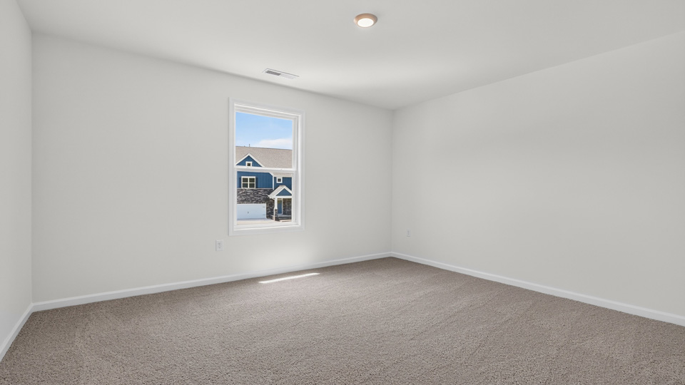 additional bedroom with window, carpeting, closet