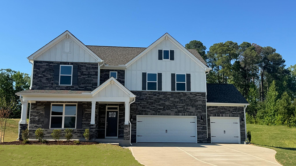 Hartwell E front exterior with 3 garages