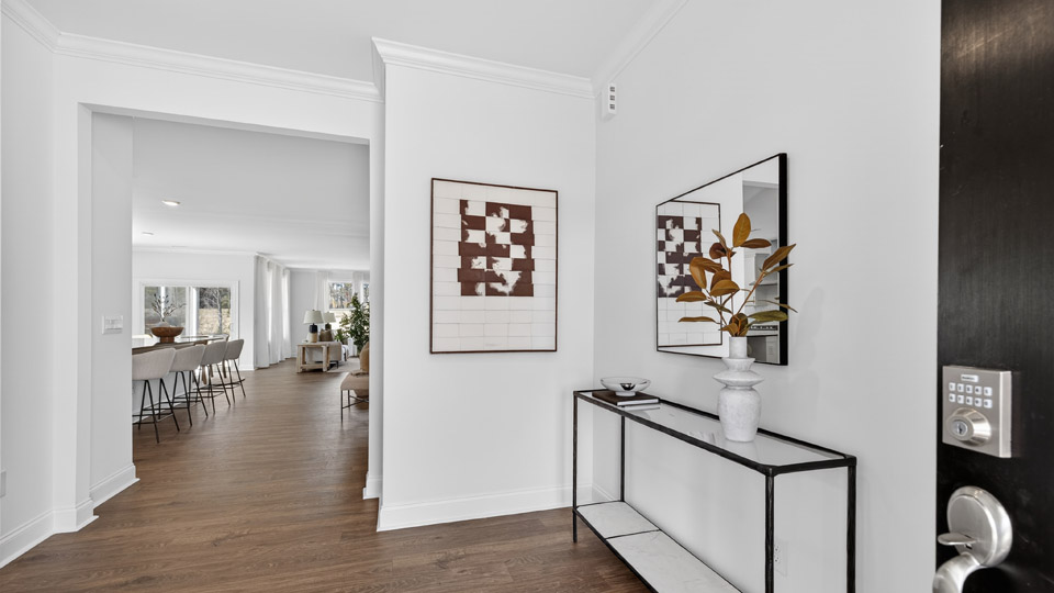 foyer entryway with revwood flooring
