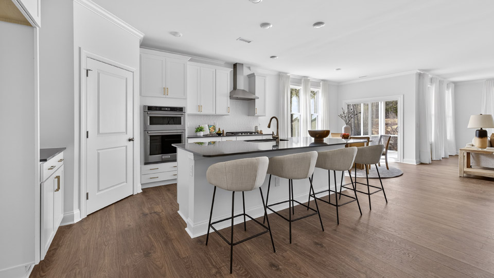 open kitchen with island and quartz countertops