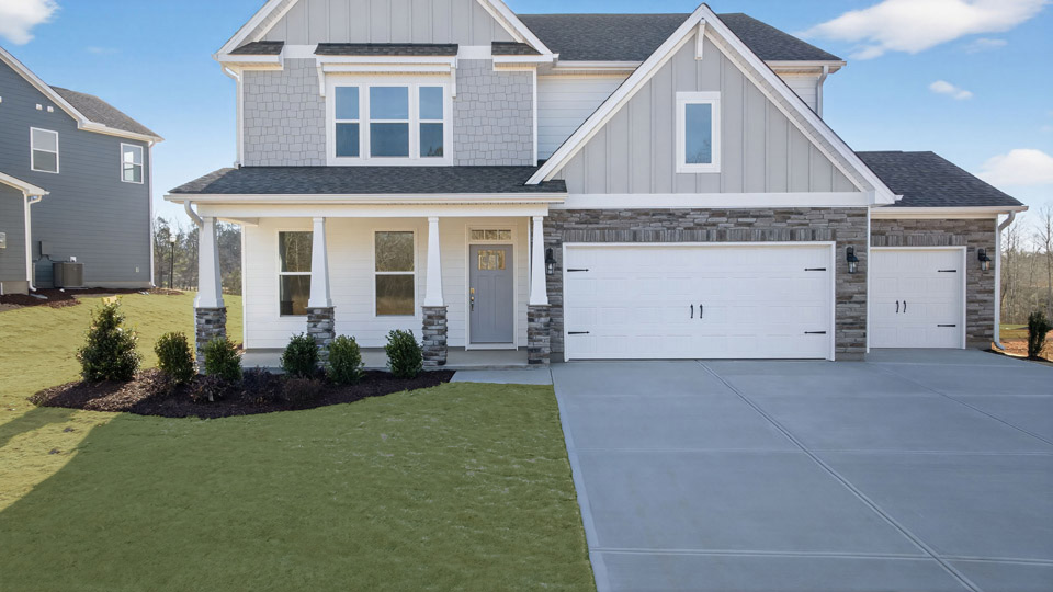 front exterior of hampshire with 3 car garage