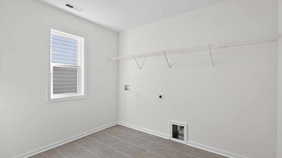 laundry room with wire shelving