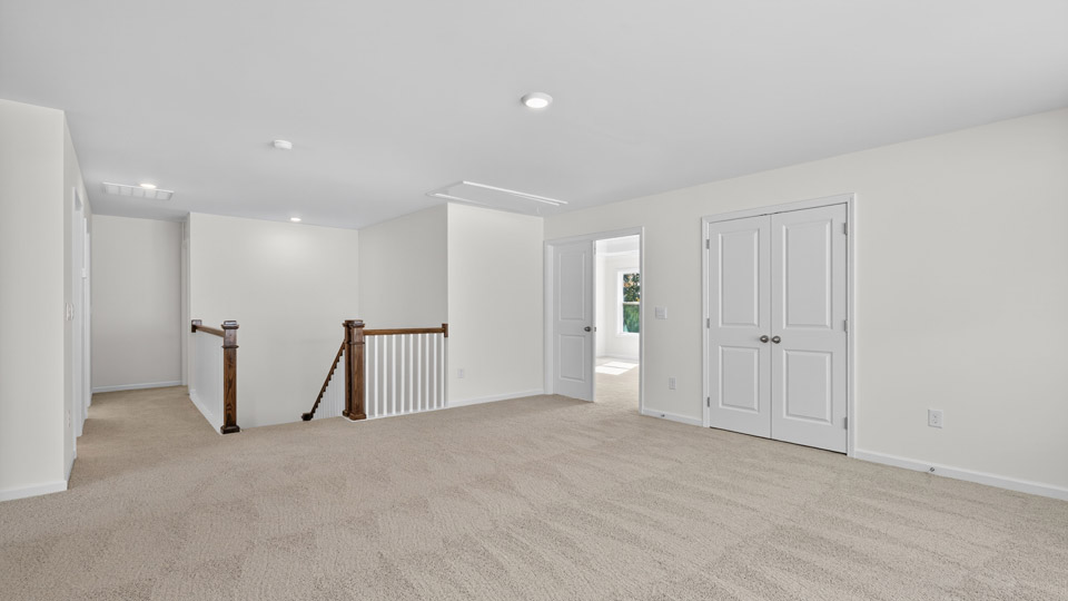 Loft with carpet flooring