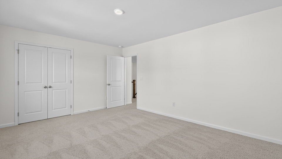 Bedroom with carpet flooring