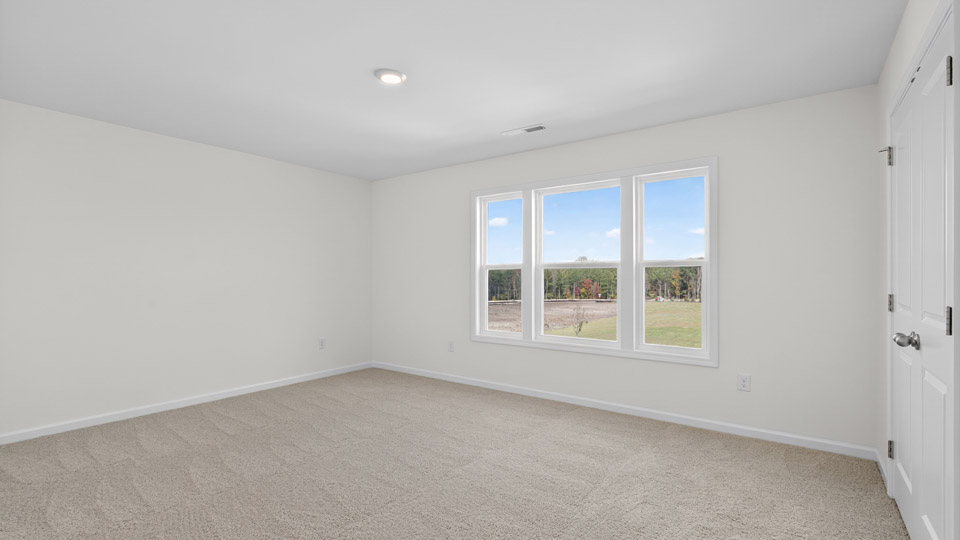 Bedroom with carpet flooring