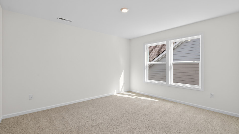 Bedroom with carpet flooring