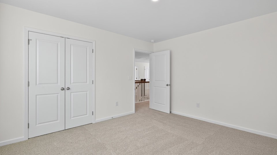Bedroom with carpet flooring