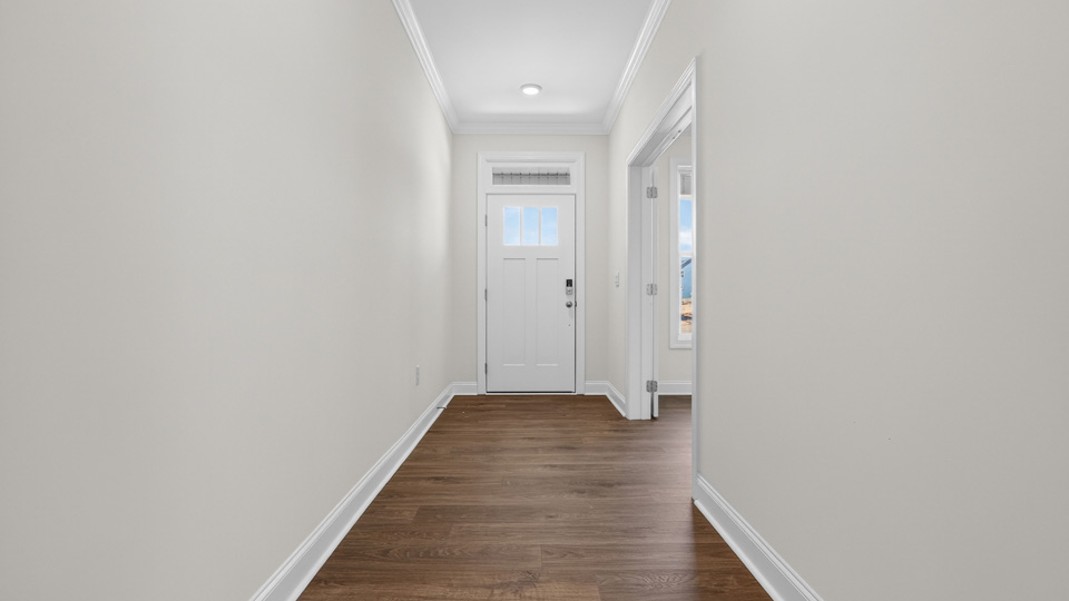 foyer entryway with revwood flooring