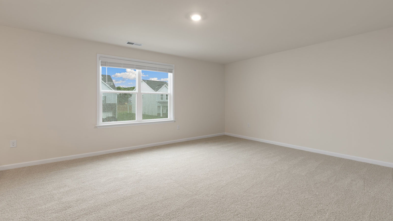 Bedroom with carpet flooring