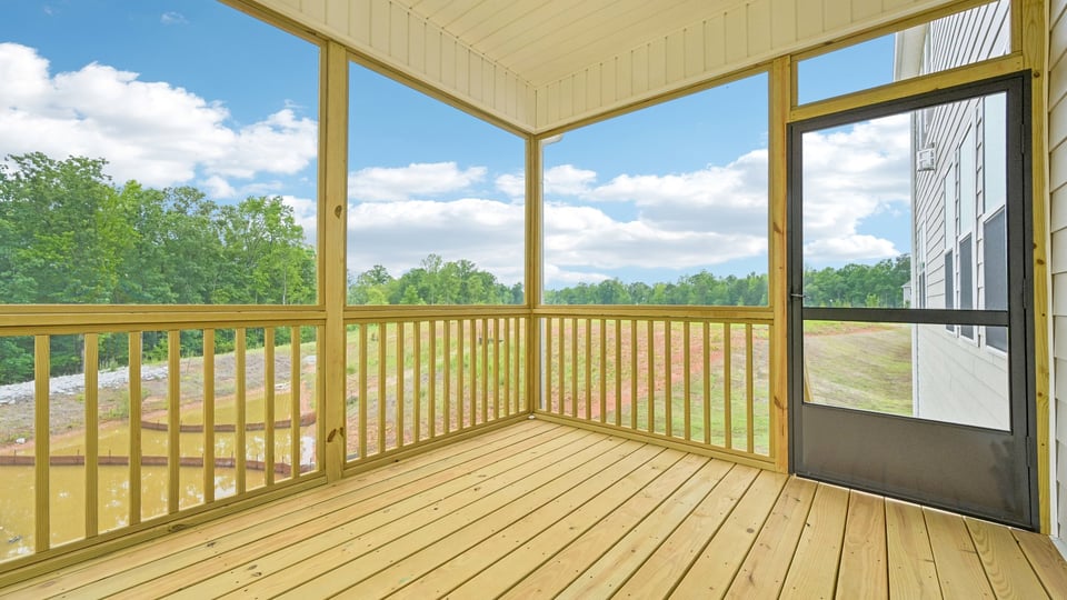 covered and screened back deck