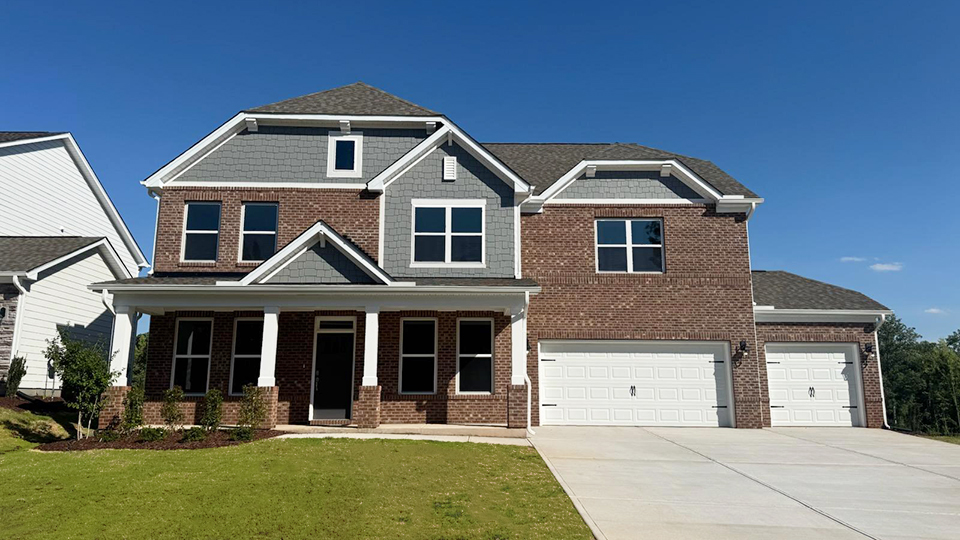 Norman D front exterior with 3 car garage