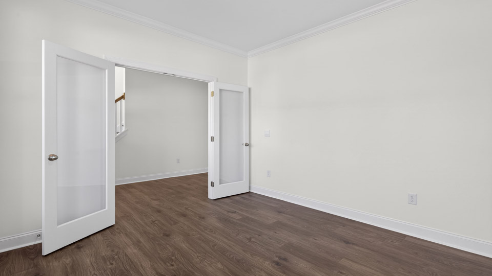 Study room with hardwood floors and big windows