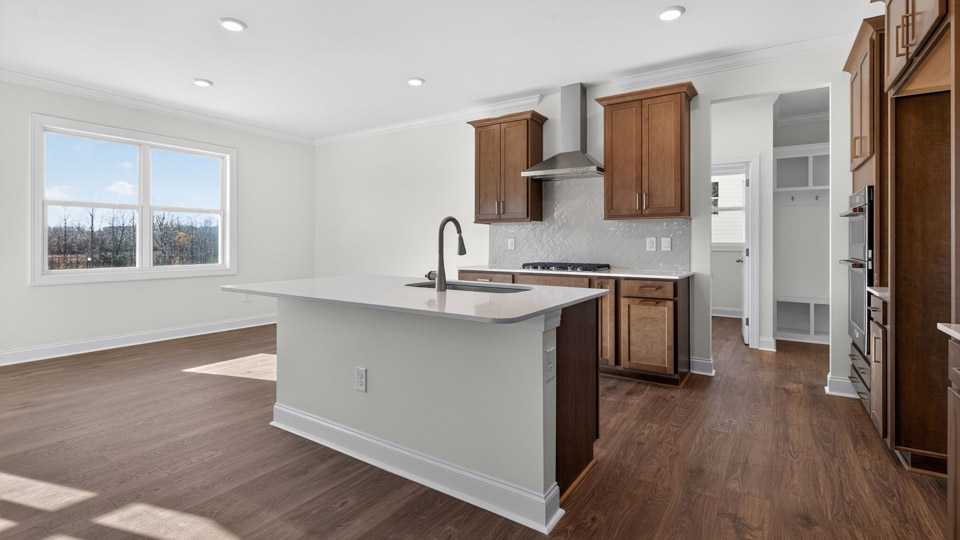 Kitchen with wood cabinets and stainless steel appliances
