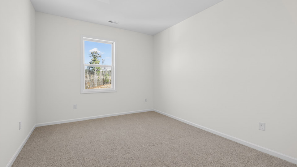 Bedroom with carpet floor and closet