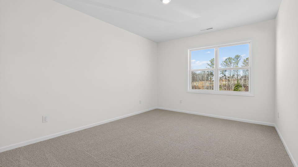 Bedroom with carpet floor and closet