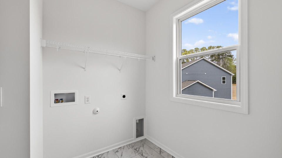 laundry room with wire shelving
