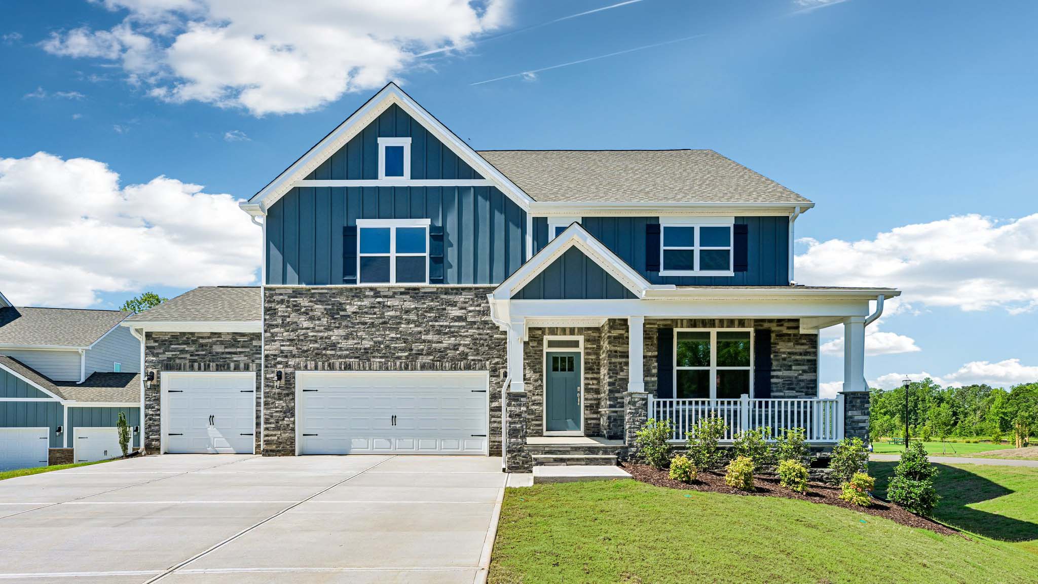 front exterior with 2 car garage
