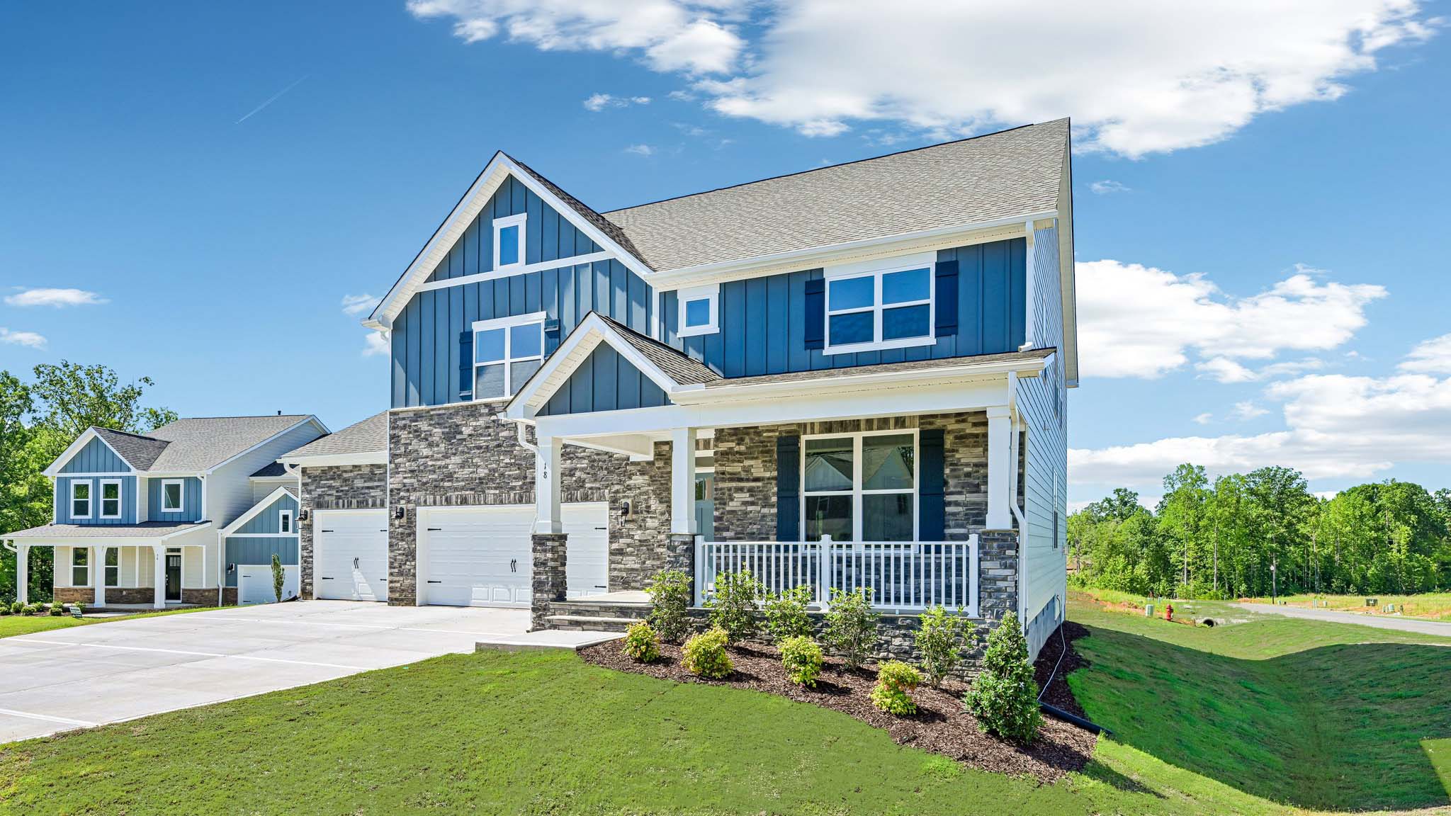 front exterior with 2 car garage