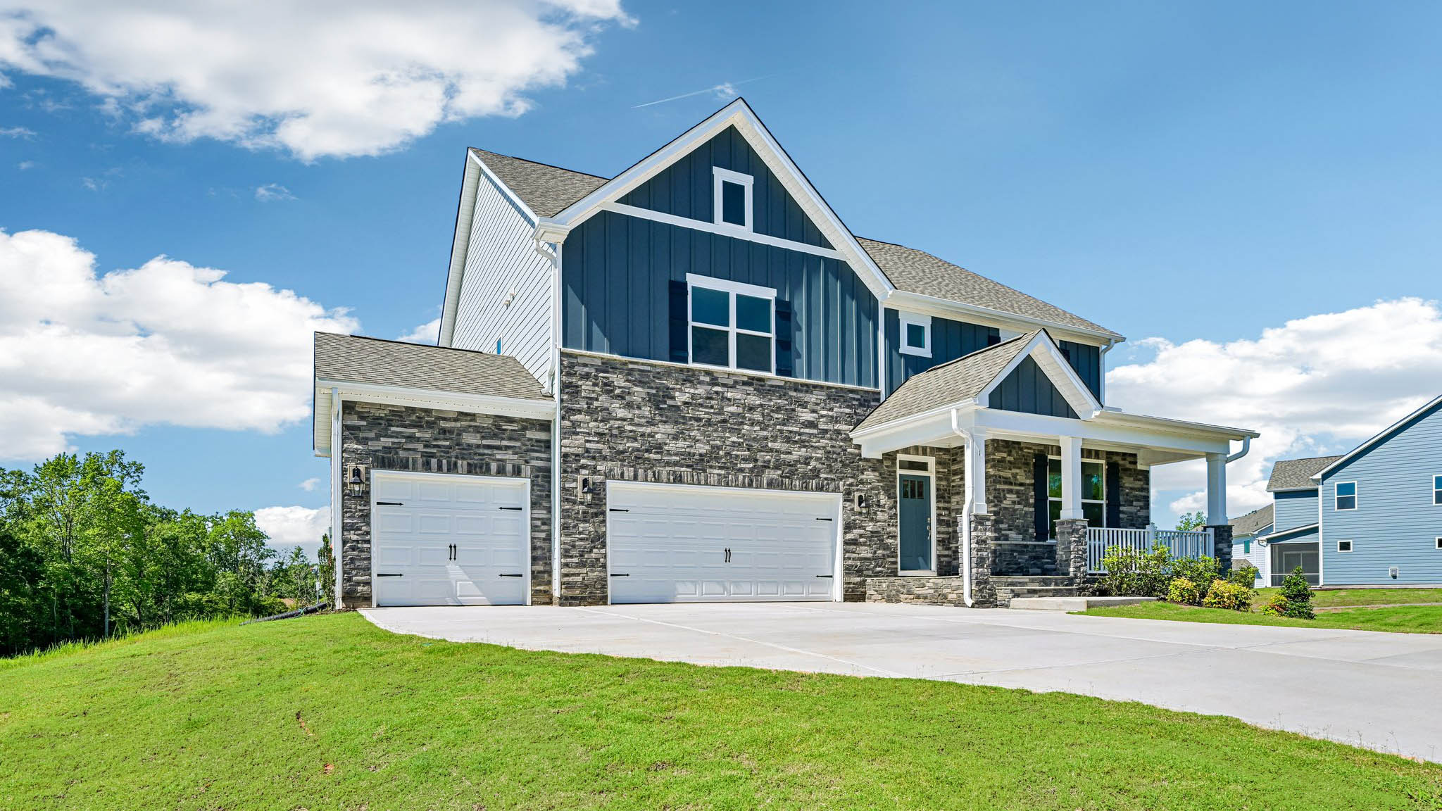 front exterior with 2 car garage