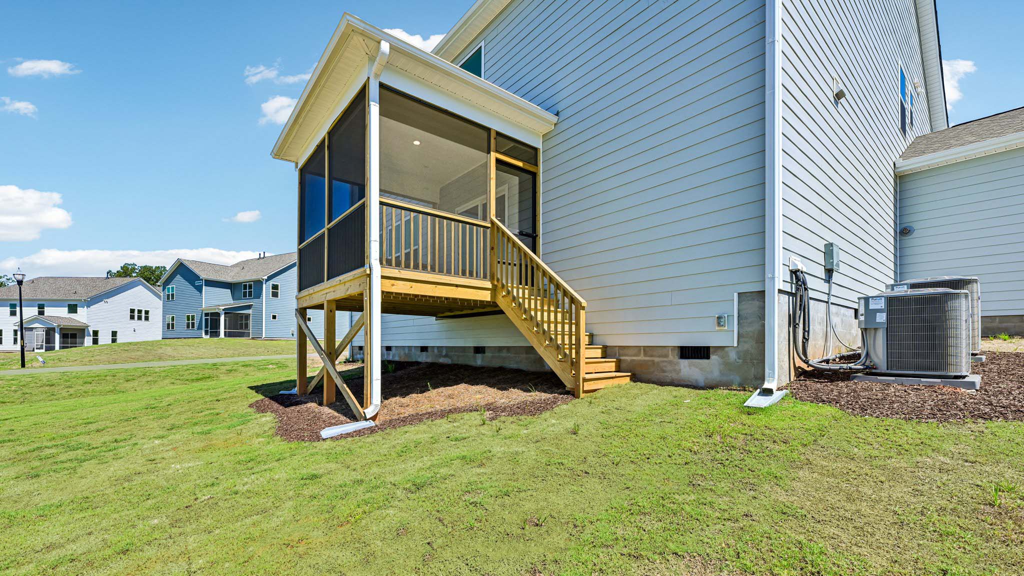 back exterior with enclosed deck