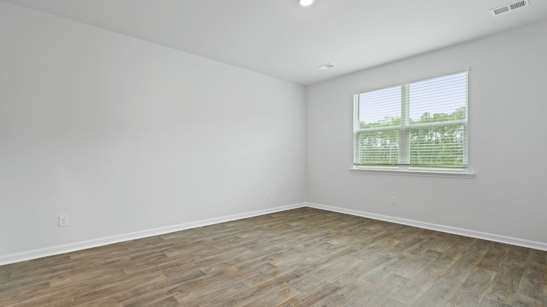 Guest bedroom with ample natural light