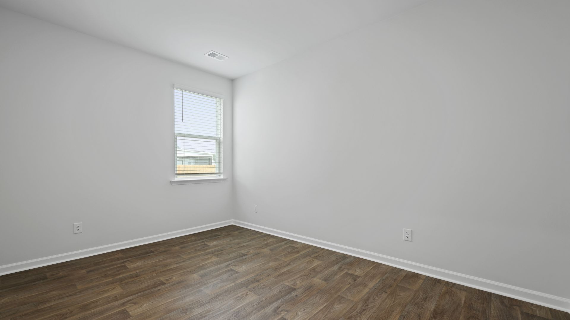Guest bedroom with LVP flooring