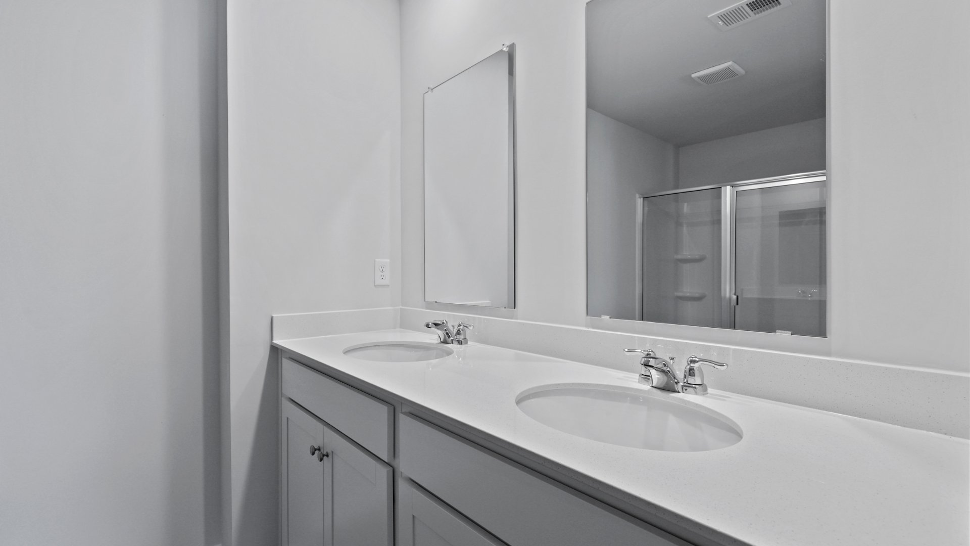 Large bathroom with dual vanity