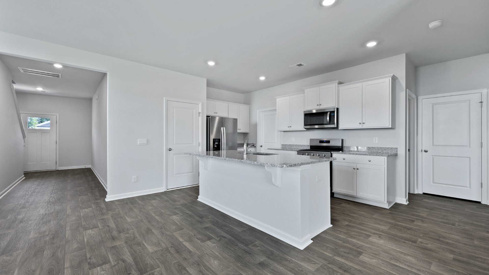 Bright kitchen with white cabinets