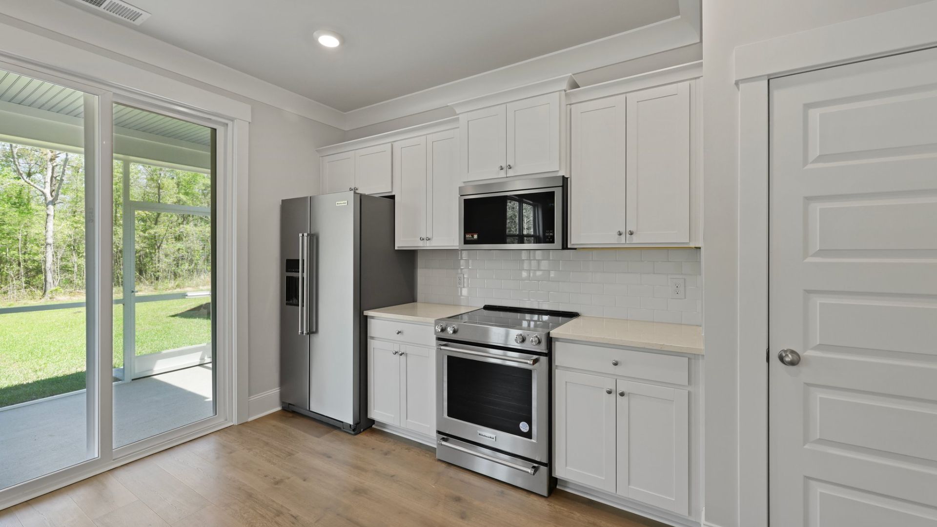 Sliding doors to backyard off the kitchen