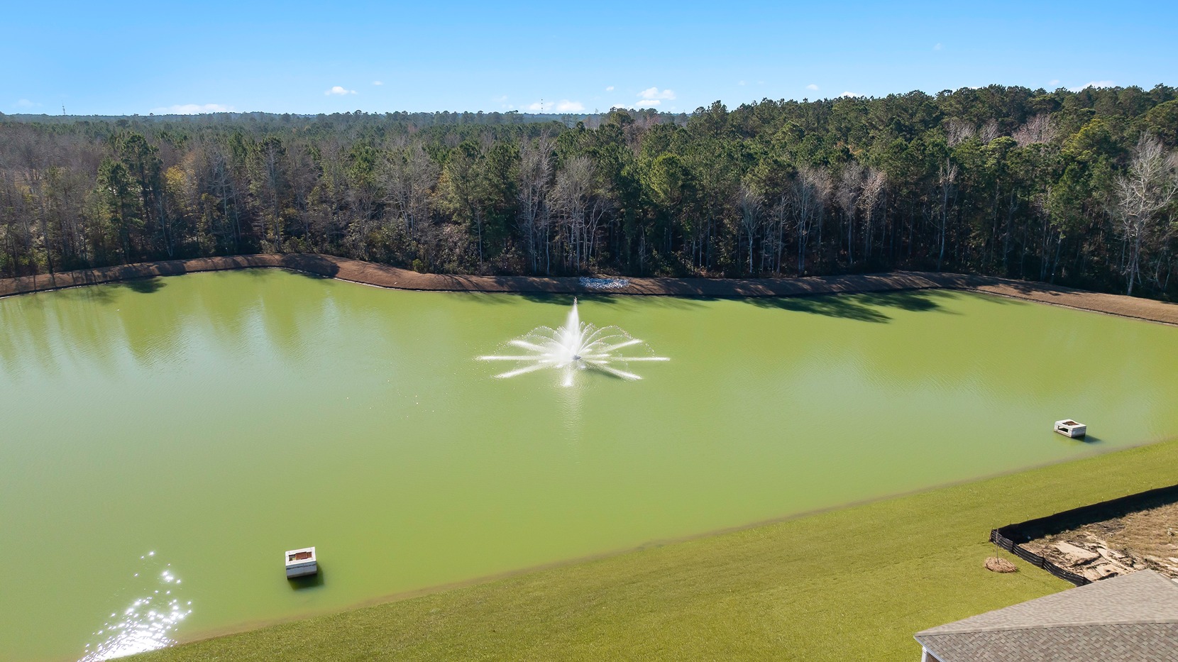 new home summerville with pond view