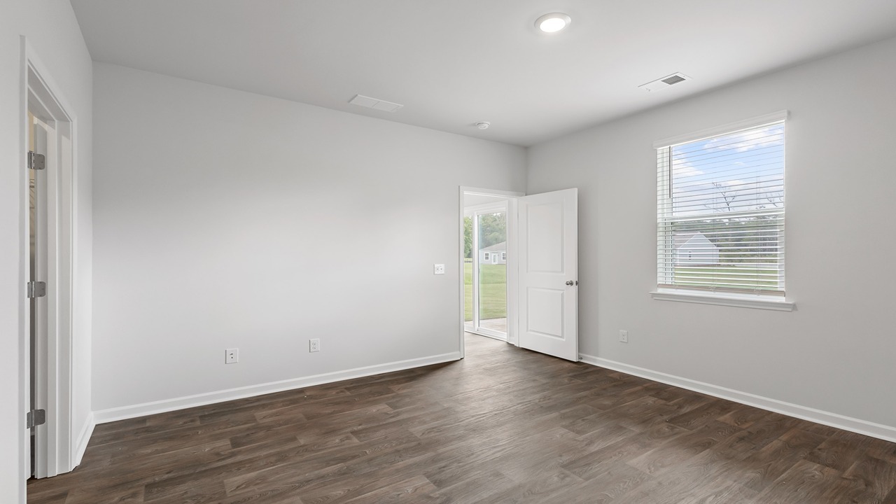 first floor primary bedroom